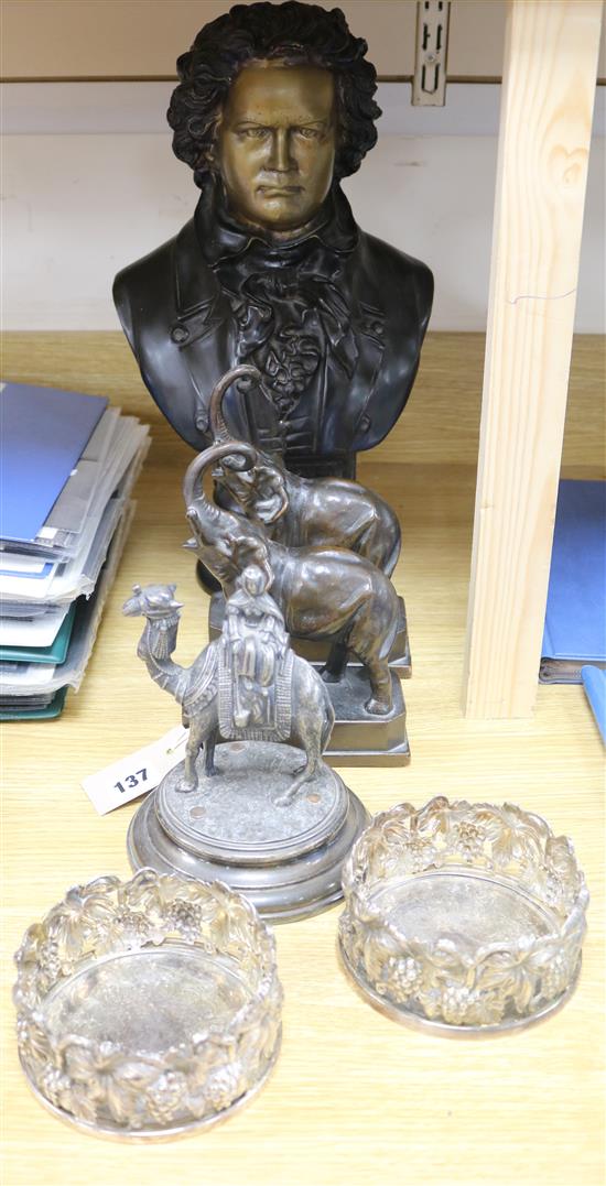 A bronze bust of Beethoven, a pair of elephant bookends, two plated coasters and an Arab on camel